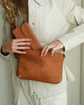 Brown waist bag and wallet